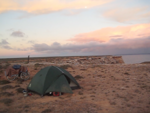 tent pitched on open empty field