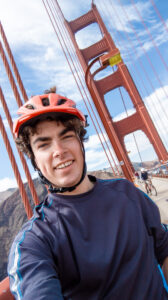 Man posing on Golden Gate Bridge