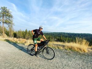 Man on bicycle getting ready for a ride, photo credit Justin M Short, BA