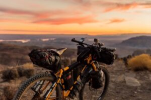 Loaded touring bicycle parked on a scenic overlook