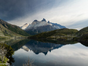 Scenic lake with mountains in the background