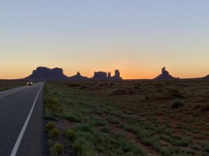 Sunrise view of rock formations in the desert.