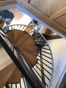 Looking down from the top of a spiral staircase