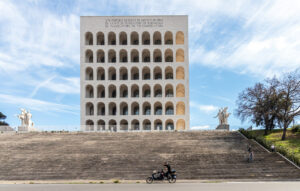 A tall building with a lot of arched windows