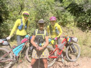 Three women with bikes