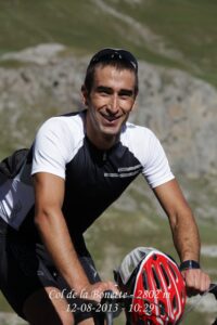 Man riding a touring bicycle