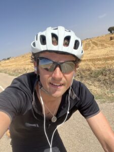 A man riding his bicycle