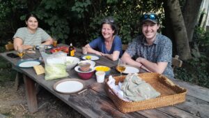 Group of people at an outdoor dining table