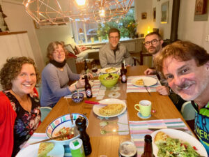 A group of people gathered around a dinner table