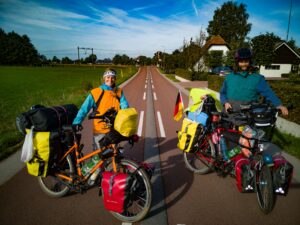 Two people on touring bicycles