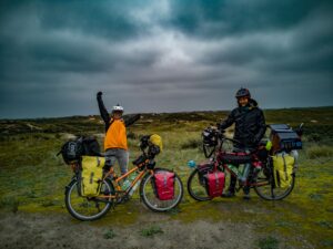 Two people on touring bicycles 